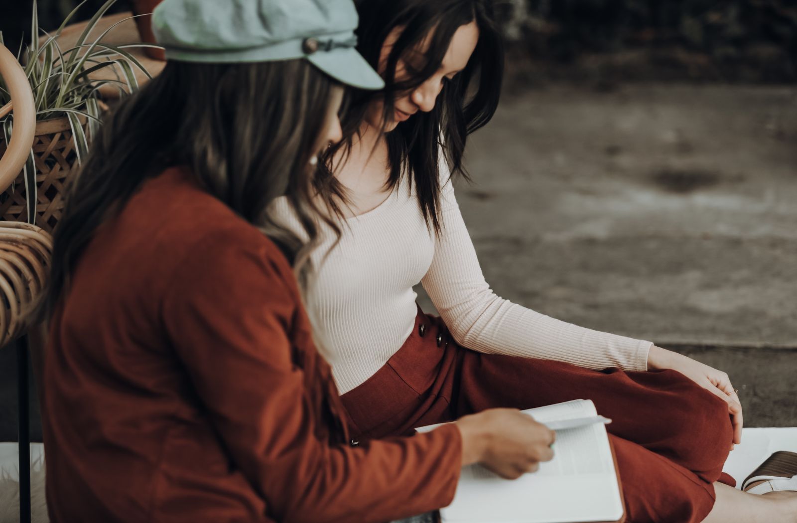 women reading the bible together