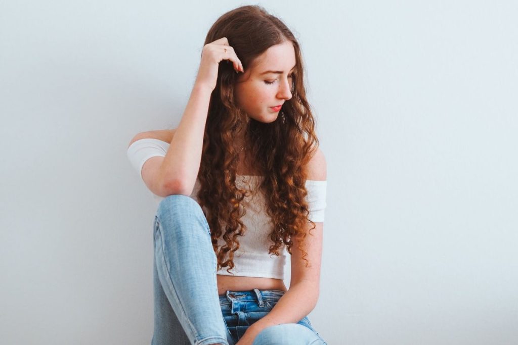 a girl sitting alone