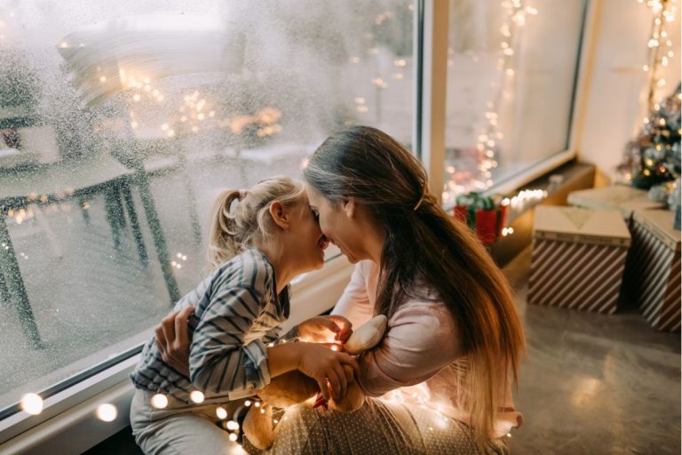 a mother and daughter on christmas