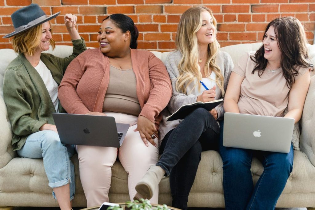 bloggers sitting on a couch