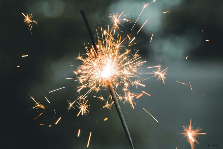 a sparkler at dusk