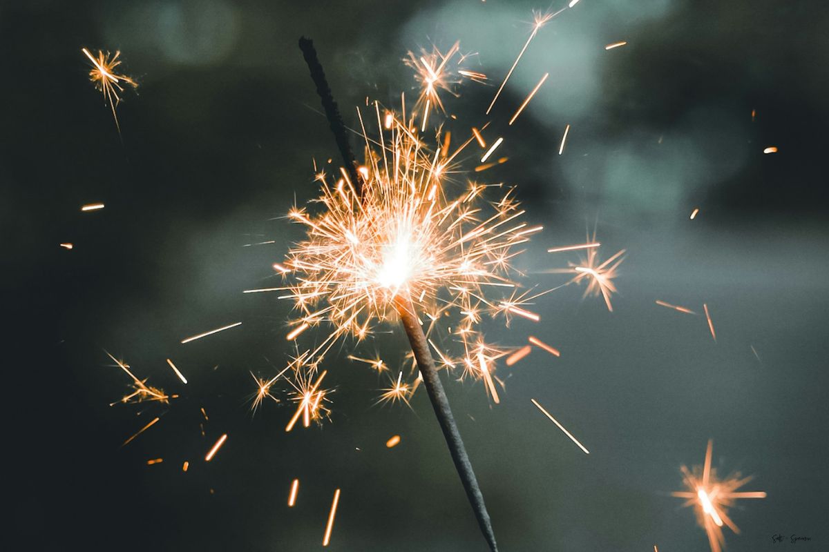 a sparkler at dusk